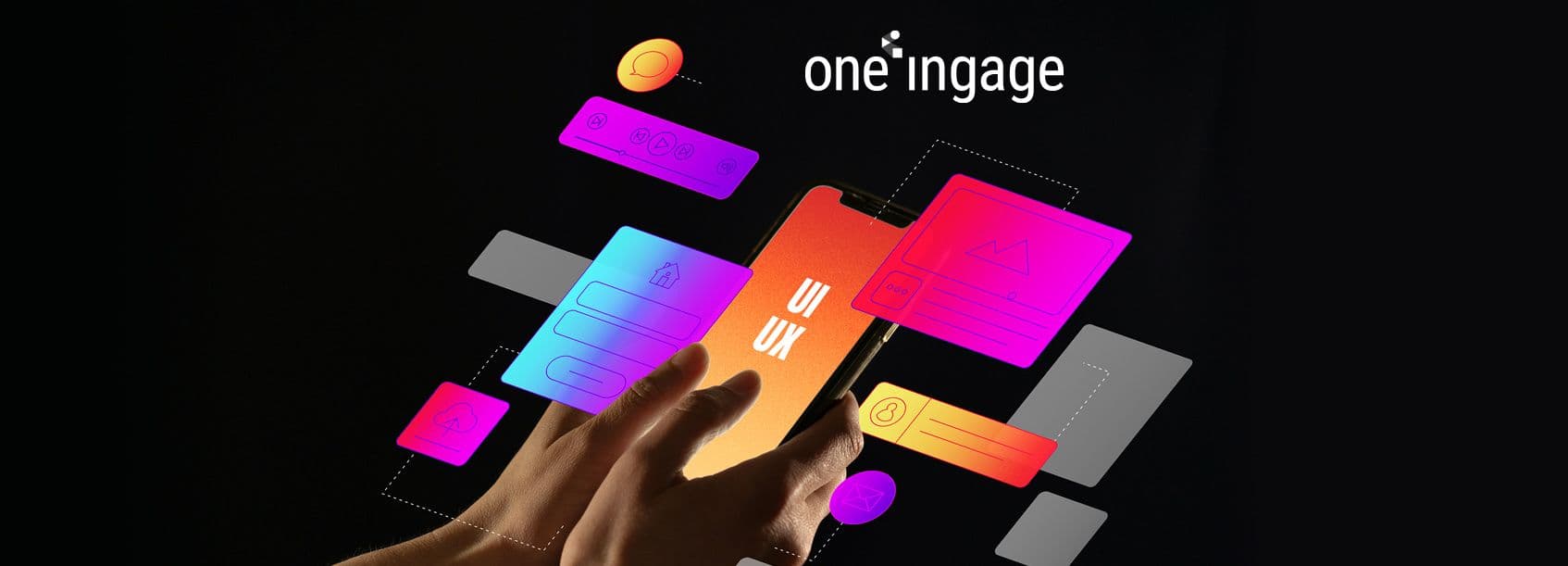A web designer reviews colorful interface mockups on multiple devices to illustrate modern web design trends.